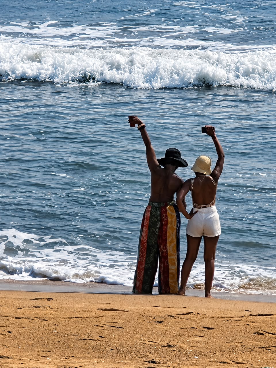 Guests cheering at the shoreline